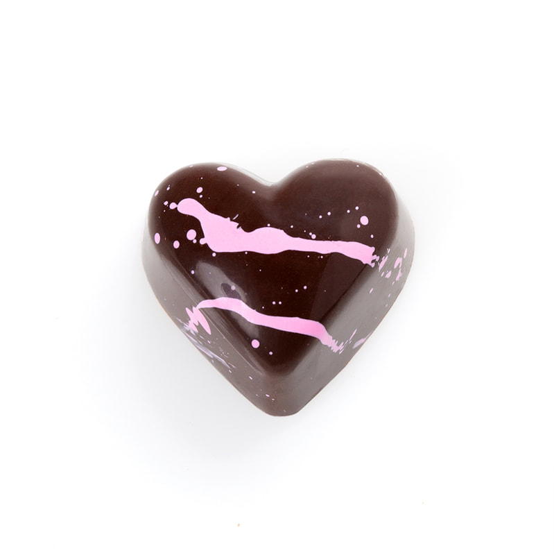 ROSE & RASPBERRY
ROSE & RASPBERRY ROSE & RASPBERRY Dark ganache infused with rose water and raspberry. Gluten-free